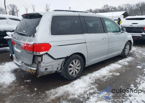 2010 Honda Odyssey Ex-L z USA, uszkodzony, nr VIN 5FNRL3H73AB061444